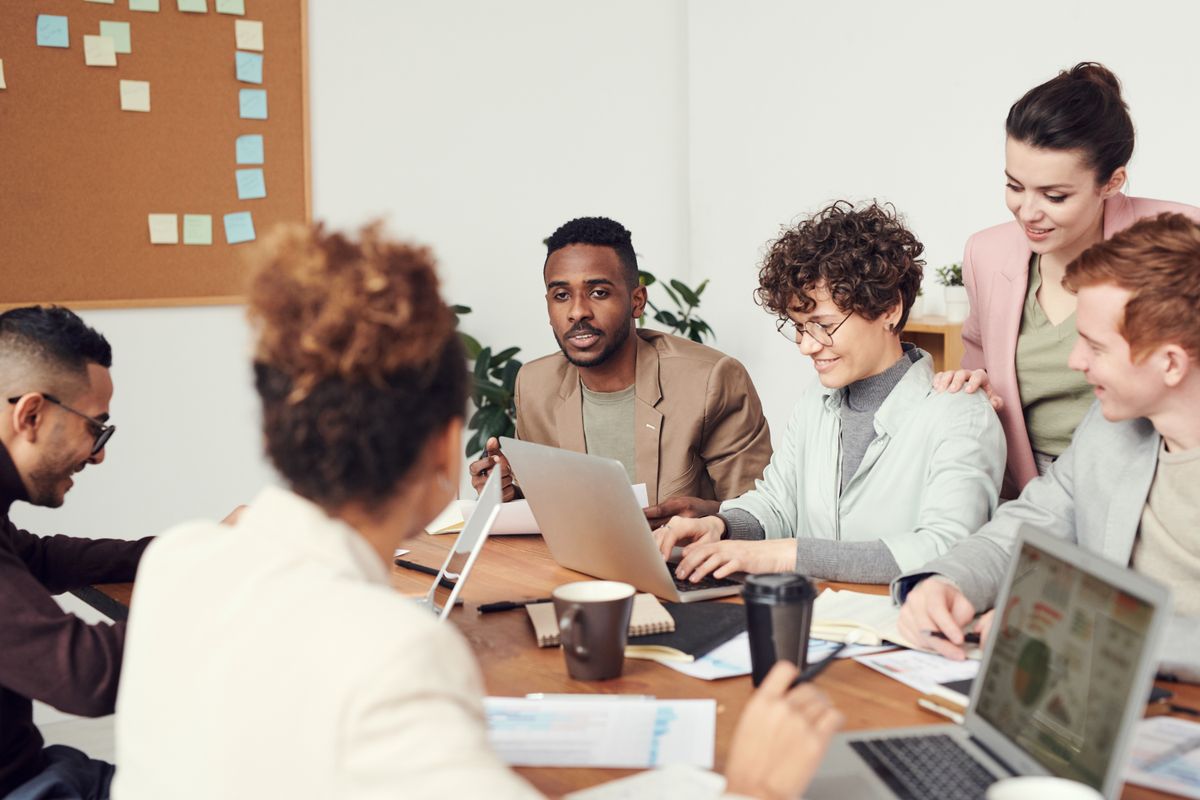 Team of professionals discussing documents in a meeting